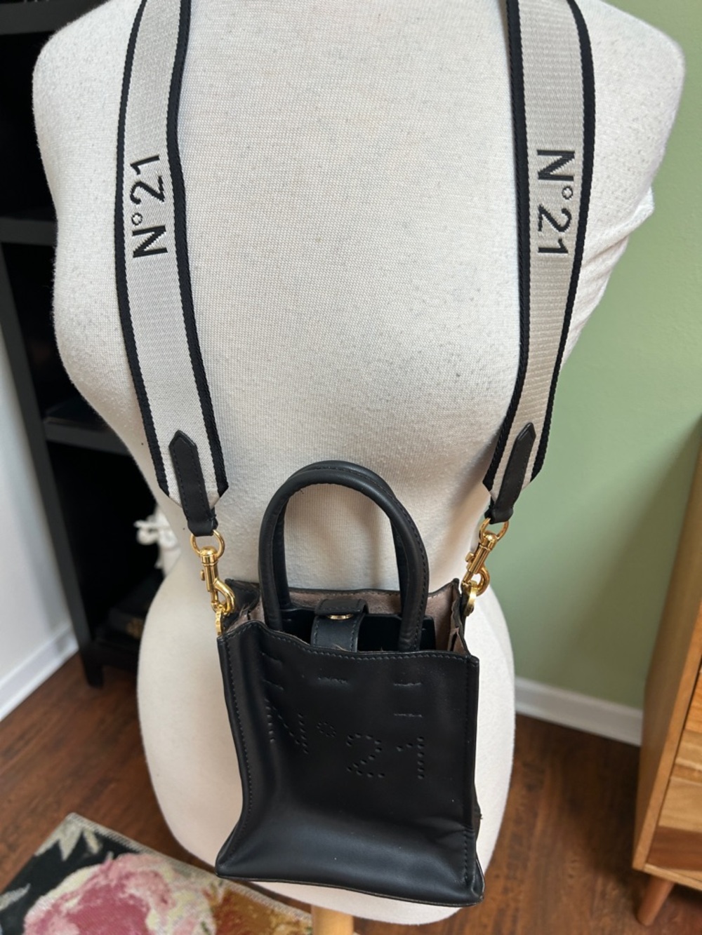 No 21 Crossbody Black Leather Mini Shoulder Bag with storage bag.